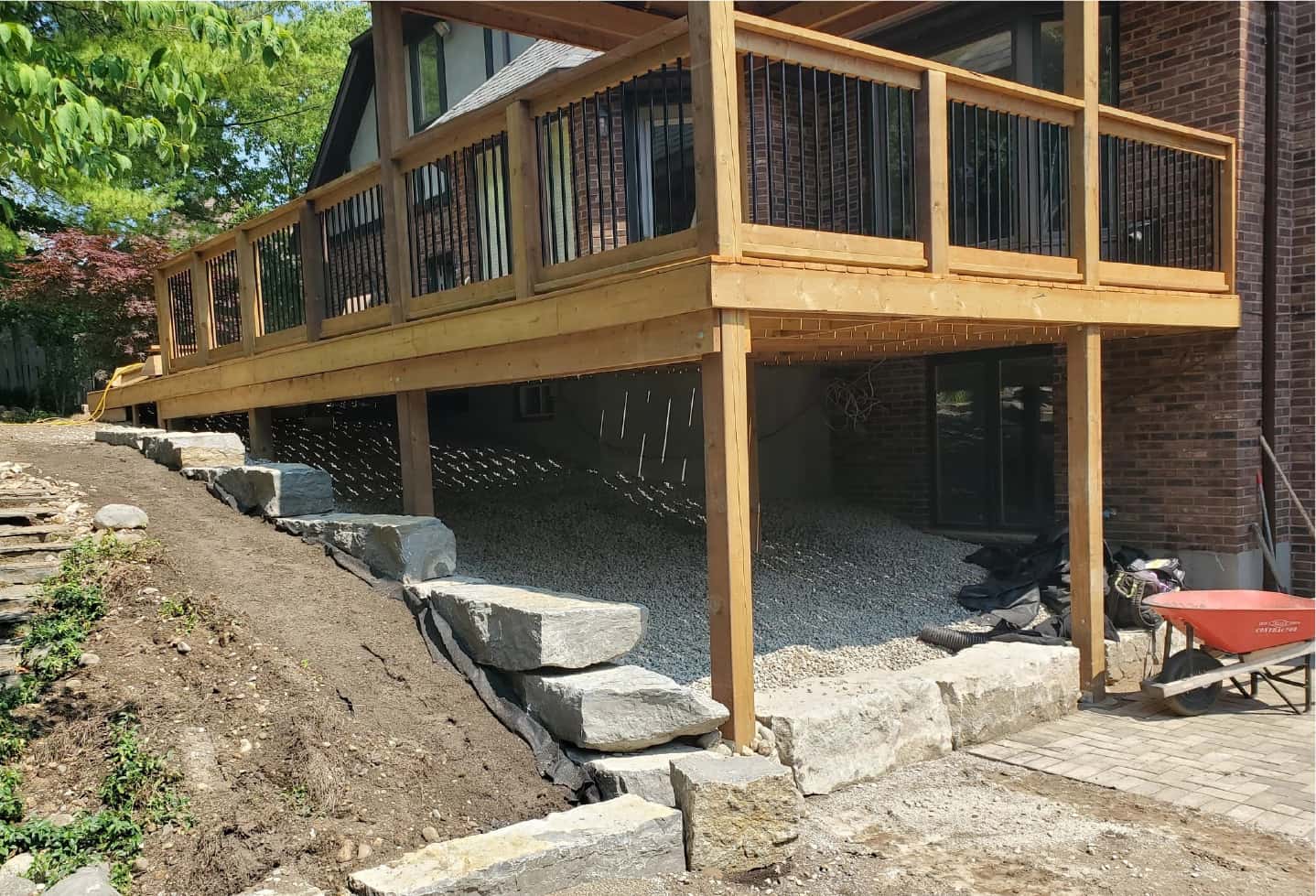 renovation of wood deck with railing, bench and gazebo in progress