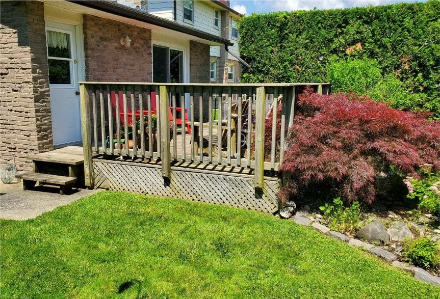 wood patio rear of house in bad shape