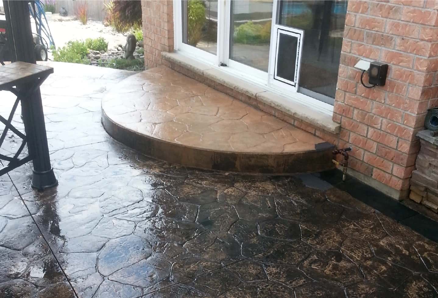 stone step of house and patio with stone tiles that need to be restained and refinished