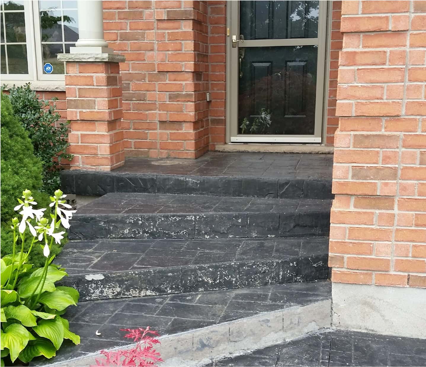 stone steps with paint finish wearing away